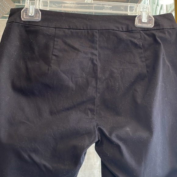 Stretchy black pants; tulip slit@bottom; side zipper; no pockets - Picture 4 of 4